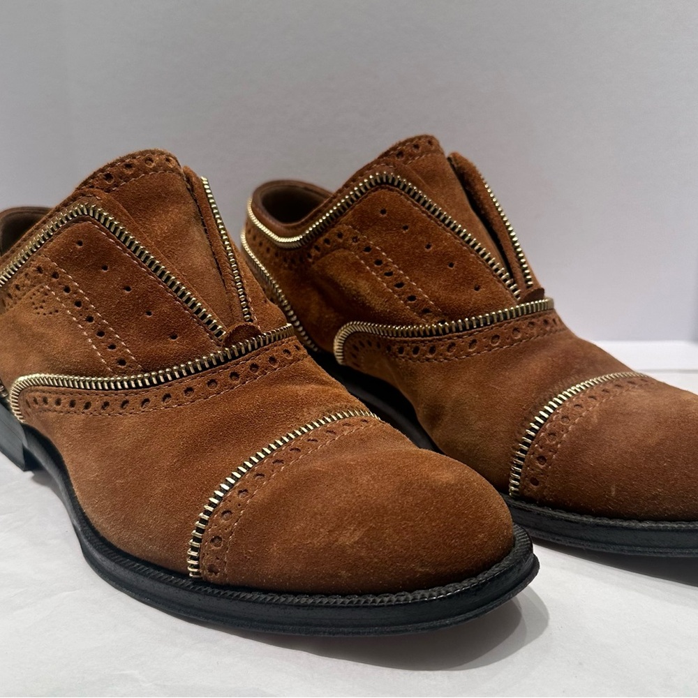 Louis Vuitton Brown Flats with Classic Detailing